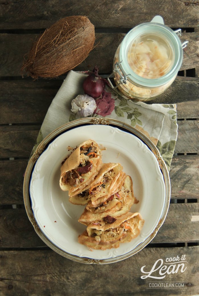 Coconut thin pancakes with sauerkraut and mushrooms