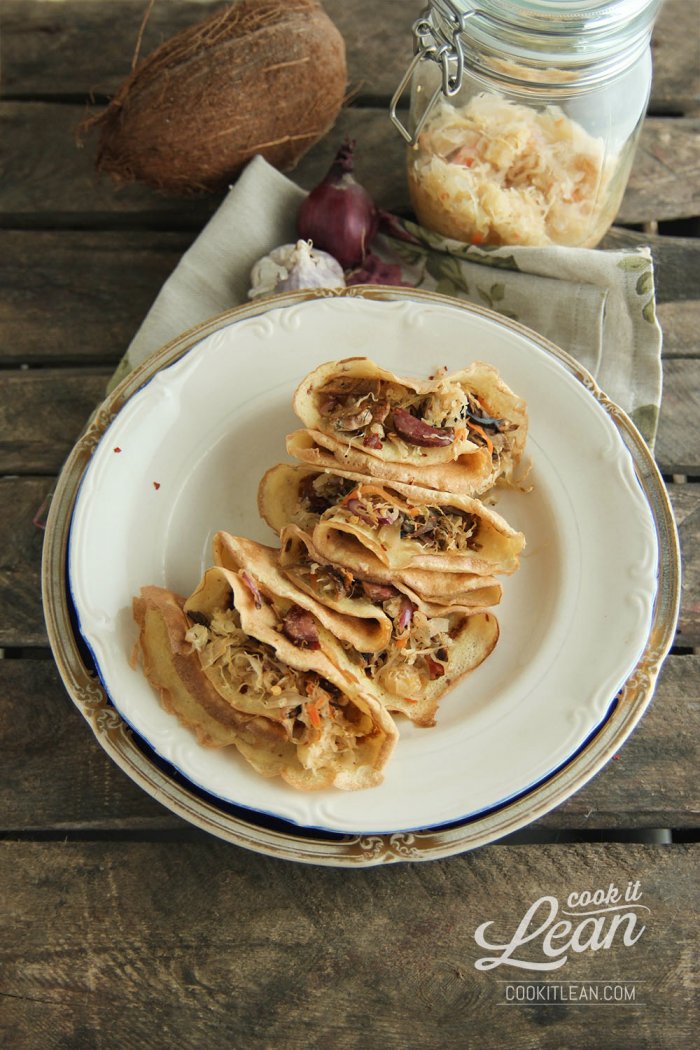 Coconut thin pancakes with sauerkraut and mushrooms